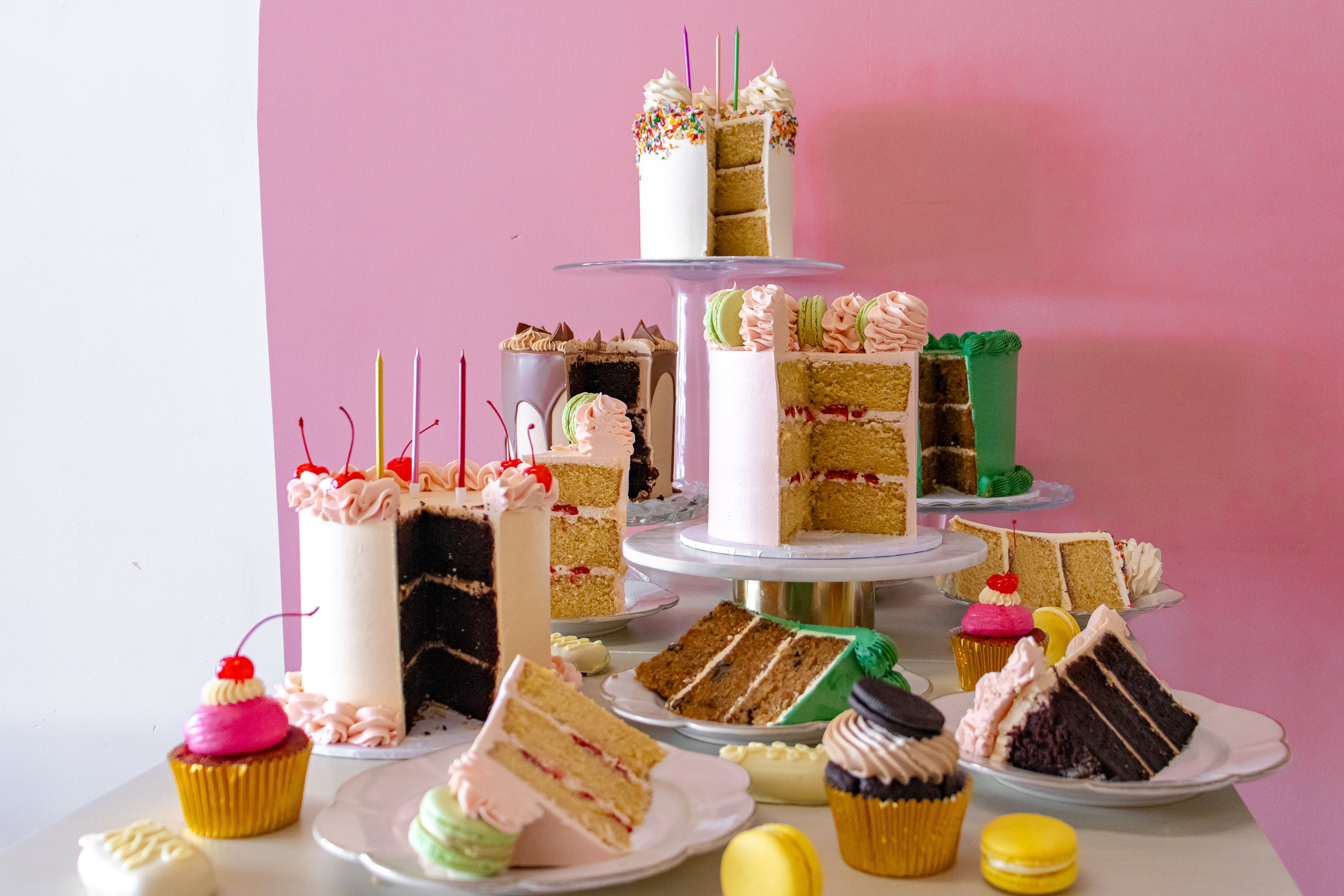 Freshly prepared layered cake with creamy filling and smooth finished frosting