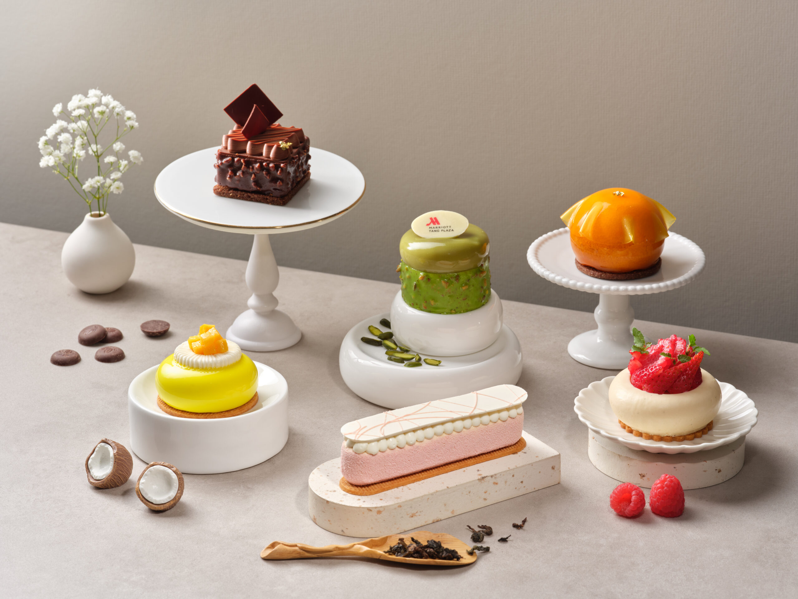 Fresh baking ingredients and cake decorating supplies arranged for dessert preparation