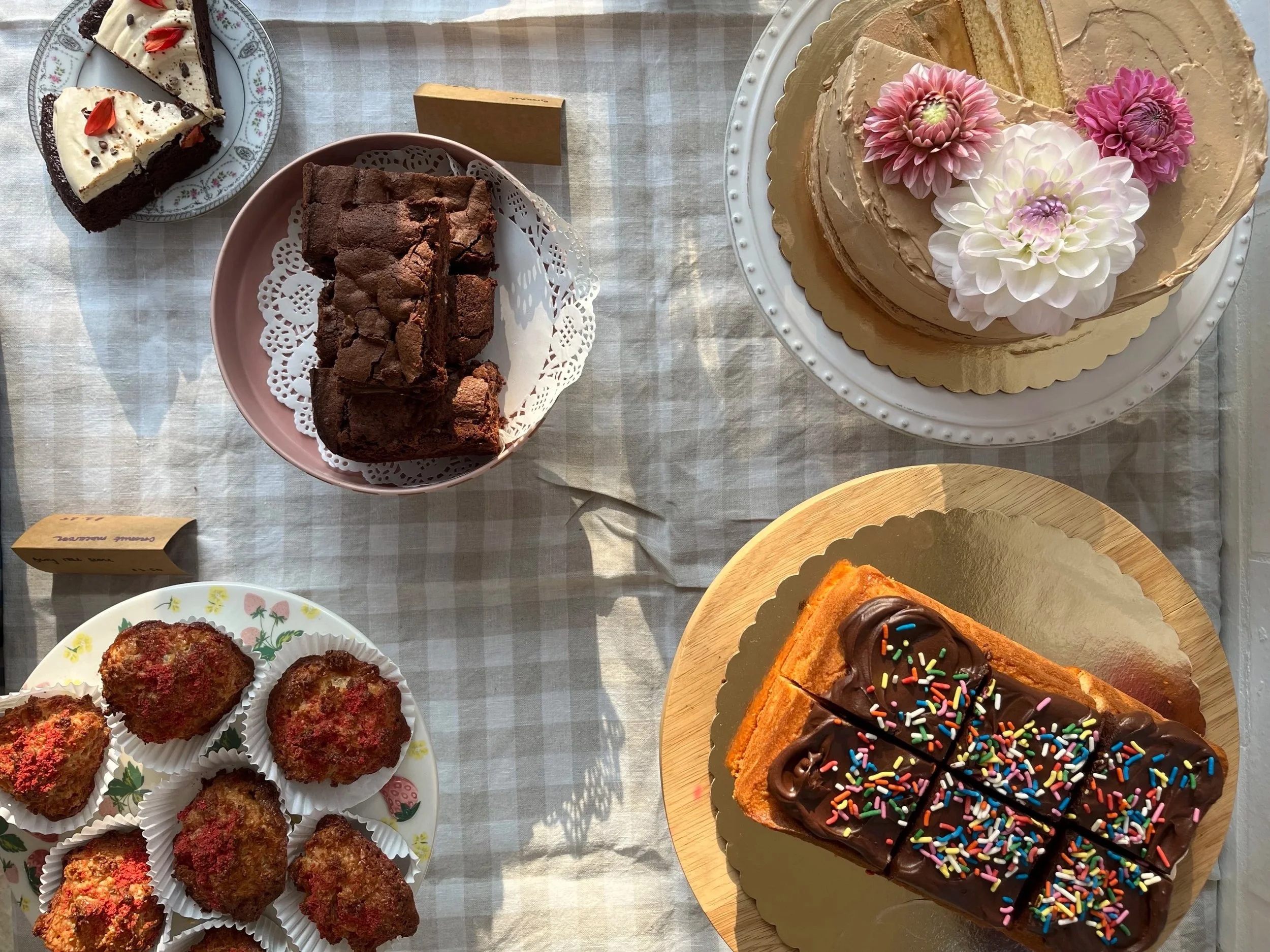 Baking ingredients and pastry tools carefully arranged for an organized cake preparation process