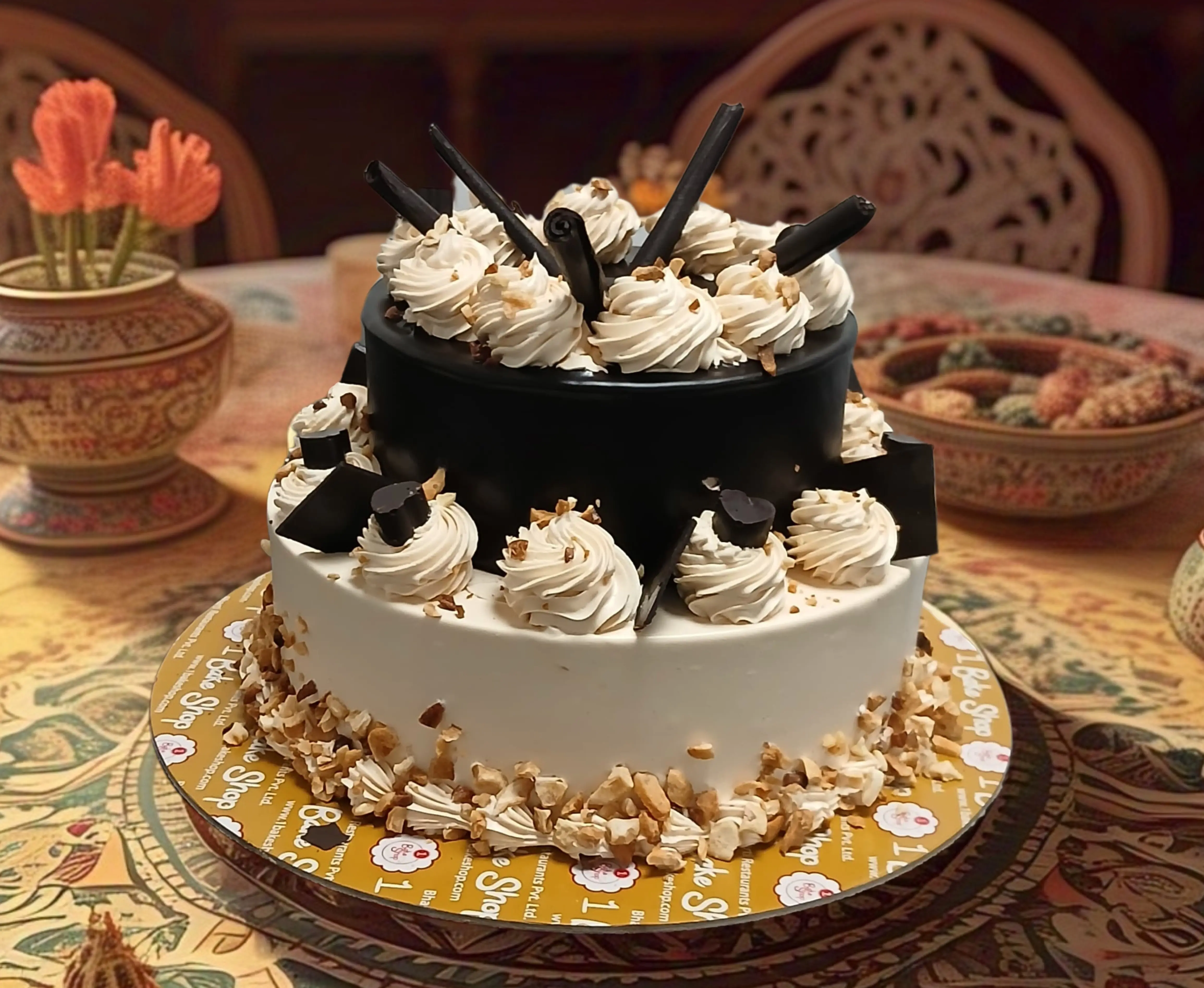 Pastry chef carefully decorating a layered cake with smooth frosting and delicate finishing touches