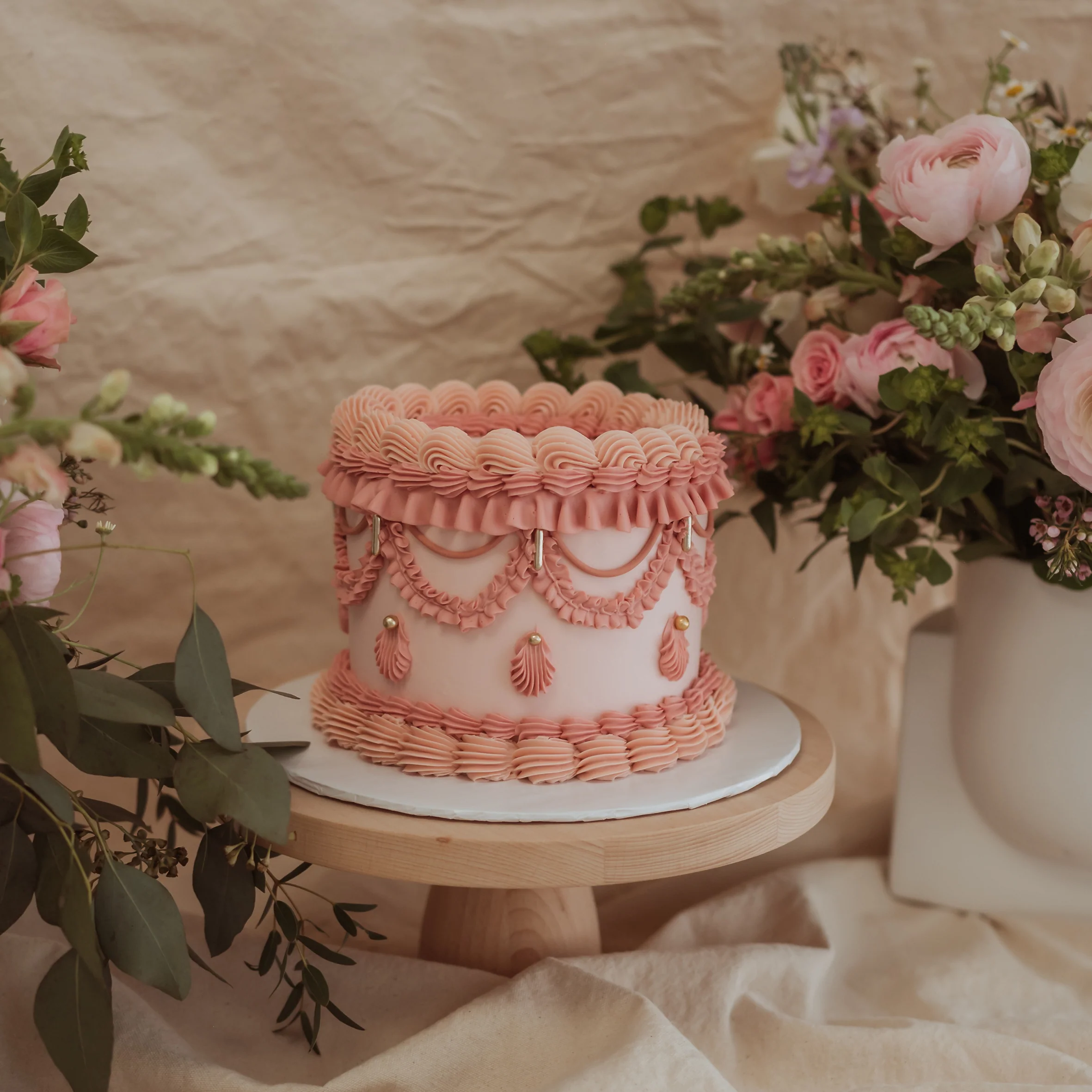Artisan chocolate dessert decorated with delicate details and a rich glossy chocolate finish