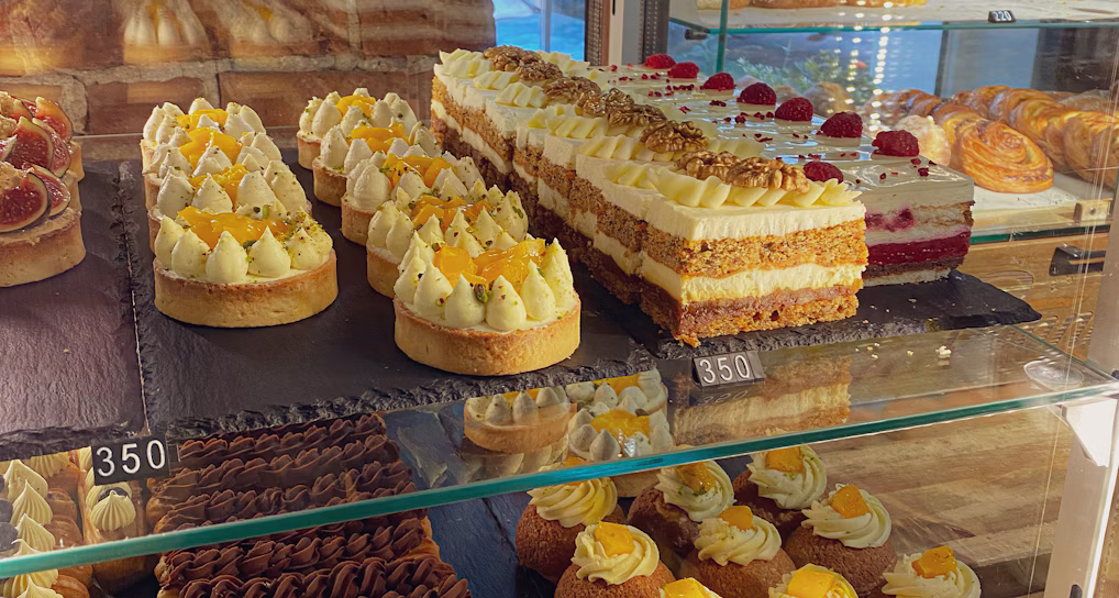 Assortment of handcrafted pastries and sweet treats arranged for a dessert table